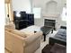 Inviting living room showcasing a fireplace, sleek furniture, and an entertainment center at 5415 W Harmon Ave # 2094, Las Vegas, NV 89103