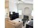 Bright living room with vaulted ceilings, fireplace, and sliding glass doors to the patio at 5415 W Harmon Ave # 2094, Las Vegas, NV 89103
