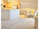 View of the living room with a dining table and open to the kitchen area with bar seating at 5415 W Harmon Ave # 2094, Las Vegas, NV 89103