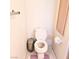 Powder room featuring a standard toilet, towel rack, and small storage cabinet for essentials at 5415 W Harmon Ave # 2094, Las Vegas, NV 89103
