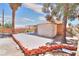 A large brick patio is the focal point of this beautiful backyard at 5536 Cleary Ct, Las Vegas, NV 89108