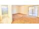 A spacious bedroom featuring plush carpeting, an en-suite bathroom, and sliding doors that lead to a patio at 5536 Cleary Ct, Las Vegas, NV 89108
