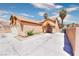 Inviting single-Gathering home with a two-car garage, well-manicured yard, and a covered front entryway at 5536 Cleary Ct, Las Vegas, NV 89108