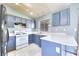 Kitchen features modern appliances, granite countertops, and ample cabinet space at 5536 Cleary Ct, Las Vegas, NV 89108