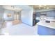 The open floor plan is ideal for modern living, connecting the kitchen and living space seamlessly at 5536 Cleary Ct, Las Vegas, NV 89108