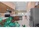 Updated kitchen featuring stainless appliances and access to an open floor plan at 608 Blooming View Ave, North Las Vegas, NV 89032