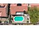Aerial shot showcases a private backyard oasis with a sparkling pool and comfortable patio area perfect for relaxation at 608 Blooming View Ave, North Las Vegas, NV 89032