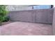 The backyard has a nice brick wall and a large brick patio for entertaining at 6339 Sharp Rock Ct, Las Vegas, NV 89139