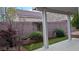 The backyard features a brick wall and a concrete patio with plants along the perimeter at 6339 Sharp Rock Ct, Las Vegas, NV 89139