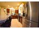 Kitchen boasts stainless steel appliances, granite counters, and breakfast bar at 6339 Sharp Rock Ct, Las Vegas, NV 89139