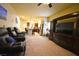 Inviting living room featuring comfortable seating and an open floor plan leading to the kitchen at 6339 Sharp Rock Ct, Las Vegas, NV 89139