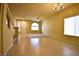 Bright, open living area with tile floors and a ceiling fan at 6339 Sharp Rock Ct, Las Vegas, NV 89139