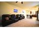 Cozy living room with plush seating and a view towards the kitchen area at 6339 Sharp Rock Ct, Las Vegas, NV 89139