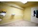 Bright walk-in closet with carpet flooring and white, installed wire shelving at 6339 Sharp Rock Ct, Las Vegas, NV 89139