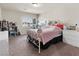 Spacious bedroom with carpet flooring, a large window, and neutral wall color at 6465 Grande River Ct, Las Vegas, NV 89139