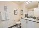 Bathroom with granite countertops, a toilet, a shower, and plenty of storage space at 6835 Orange Horizon St, North Las Vegas, NV 89086
