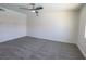 Bedroom with plush carpet and a ceiling fan at 6842 Greengrove Dr, Las Vegas, NV 89103