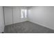 Cozy bedroom with soft carpet and a large closet at 6842 Greengrove Dr, Las Vegas, NV 89103