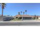 Charming single-story home featuring a well-maintained front yard and a two-car garage at 6842 Greengrove Dr, Las Vegas, NV 89103
