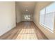 Bright, open living room with hardwood floors and lots of natural light at 6842 Greengrove Dr, Las Vegas, NV 89103