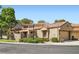Well-maintained home with a two-car garage and neat landscaping at 7296 Mission Hills Dr, Las Vegas, NV 89113