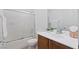 Bathroom with shower, tile flooring and single vanity at 7448 Lintwhite St, North Las Vegas, NV 89084