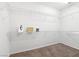 Walk-in closet with white wire shelving and carpet flooring at 7448 Lintwhite St, North Las Vegas, NV 89084