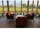 View of a sitting area overlooking a golf course and mountains at 7448 Lintwhite St, North Las Vegas, NV 89084