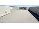 Expansive roof deck offers an outdoor space for entertaining and enjoying panoramic neighborhood views at 7791 Misty Oaks Ave, Las Vegas, NV 89113
