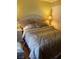 Relaxing bedroom featuring a plush bed and ambient lighting from bedside lamps at 7950 W Flamingo Rd # 2074, Las Vegas, NV 89147