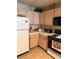 Well-equipped kitchen with neutral cabinetry and tiled backsplash, ready for culinary adventures at 7950 W Flamingo Rd # 2074, Las Vegas, NV 89147