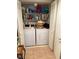 Convenient laundry area nestled behind louvered doors, equipped with washer and dryer at 7950 W Flamingo Rd # 2074, Las Vegas, NV 89147