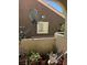 Outdoor patio with plants, satellite dish, and view of the neighborhood at 7950 W Flamingo Rd # 2074, Las Vegas, NV 89147