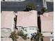 Aerial view of a home with a tile roof and backyard green space at 971 Whispering Grove Ave, Las Vegas, NV 89123
