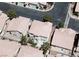 An aerial shot of a neighborhood featuring homes with uniform tile roofs and landscaping at 971 Whispering Grove Ave, Las Vegas, NV 89123