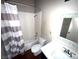 The bathroom includes a shower-tub combo, toilet, and sink with modern fixtures at 971 Whispering Grove Ave, Las Vegas, NV 89123