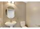 Powder bathroom features a modern sink, stylish mirror, and updated fixtures at 971 Whispering Grove Ave, Las Vegas, NV 89123