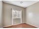 A cozy bedroom featuring natural light from the window at 971 Whispering Grove Ave, Las Vegas, NV 89123