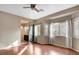 Bedroom with hardwood floors, natural light and an ensuite bathroom at 971 Whispering Grove Ave, Las Vegas, NV 89123