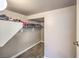 This closet features a shelf for shoe storage and plenty of space for accessories at 9760 Arch Canyon Ct, Las Vegas, NV 89149