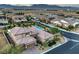 Stunning home showcasing a refreshing pool and well-manicured landscaping in a beautiful neighborhood setting at 9760 Arch Canyon Ct, Las Vegas, NV 89149