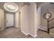 This home features an inviting foyer with hardwood floors and stairs leading to the second floor at 9760 Arch Canyon Ct, Las Vegas, NV 89149