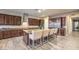 Beautiful kitchen with granite countertops, and a stainless steel refrigerator at 9760 Arch Canyon Ct, Las Vegas, NV 89149