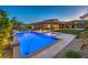 Enjoy the sparkling pool and spa combo in this meticulously landscaped backyard at 9760 Arch Canyon Ct, Las Vegas, NV 89149