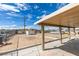 Spacious backyard with covered patio, offering potential for landscaping and outdoor enjoyment at 1013 Cunningham Dr, Las Vegas, NV 89106