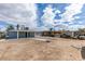 View of backyard and covered patio, situated in a neighborhood with mature landscaping at 1013 Cunningham Dr, Las Vegas, NV 89106