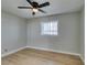 Bedroom features a ceiling fan and a window at 1013 Cunningham Dr, Las Vegas, NV 89106