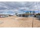 Home's exterior is accented by a low-pitched roof, desert landscaping, and adjacent parking at 1013 Cunningham Dr, Las Vegas, NV 89106