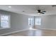 Bright living room featuring new floors, recessed lighting, and multiple windows at 1013 Cunningham Dr, Las Vegas, NV 89106