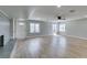 Bright living room featuring new floors, a ceiling fan, a fireplace and lots of natural light at 1013 Cunningham Dr, Las Vegas, NV 89106